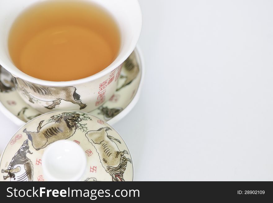 Cup of chinese tea  on white background