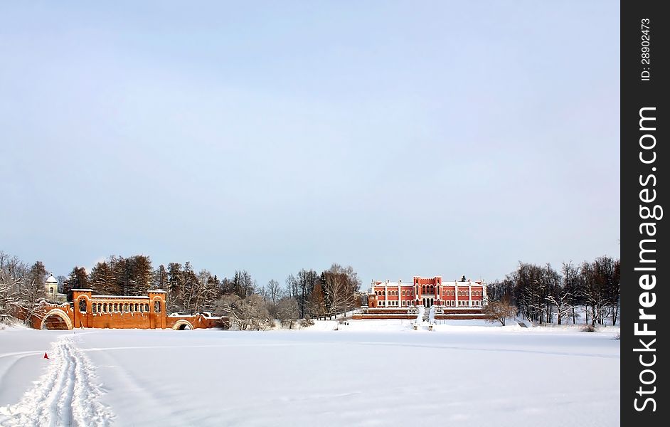 Palace and a bridge of the eighteenth century in winter. Palace and a bridge of the eighteenth century in winter