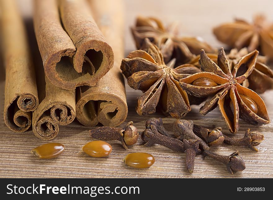 Closeup of cloves , cinnamon sticks and anise stars spices.