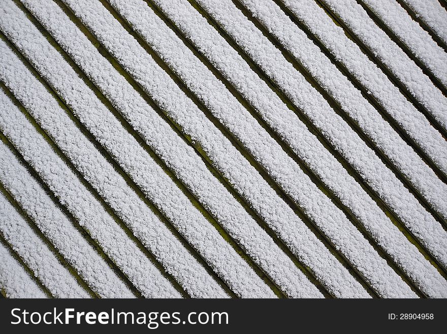 Snow On The Roof Of A Hut