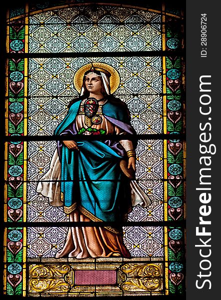 A depiction of Virgin Mary on a stained glass, in the Transfiguration of the Lord Greek-Catholic cathedral of Cluj, Romania. A depiction of Virgin Mary on a stained glass, in the Transfiguration of the Lord Greek-Catholic cathedral of Cluj, Romania