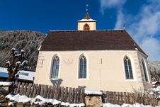 A Wintertime View Of A Small Church With A Tall Steeple Stock Photography