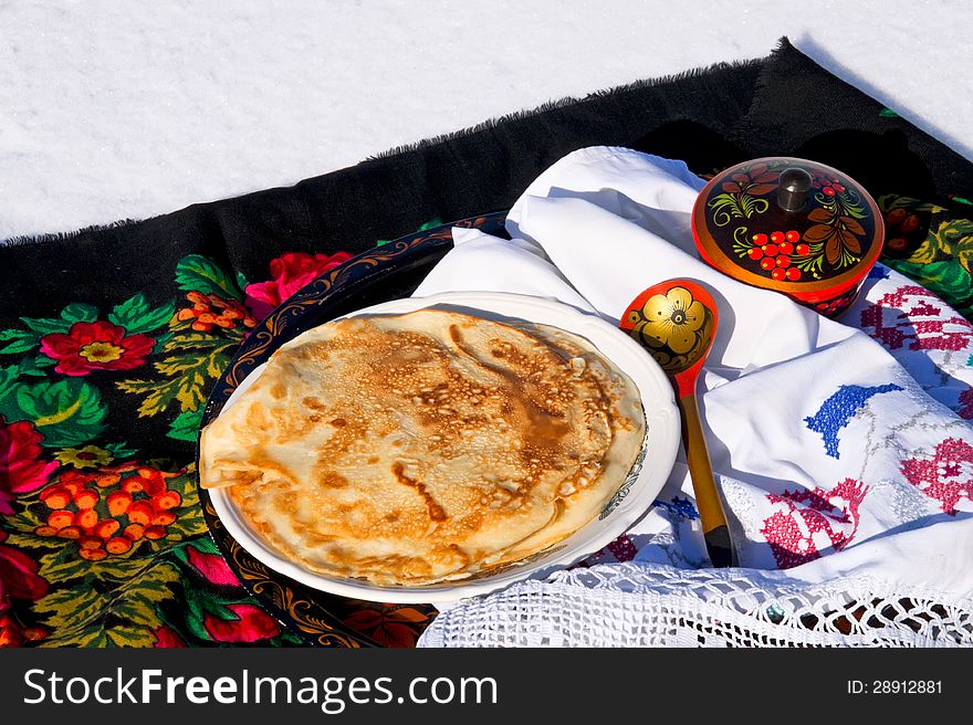Pancake pancakes in the Russian style in the snow