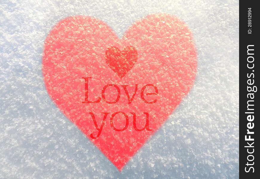 Red heart and the inscription on the snow. Red heart and the inscription on the snow