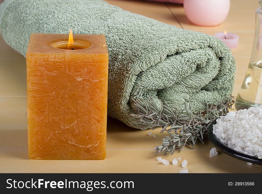 Aromatic spa set with sea salt and colored candles.