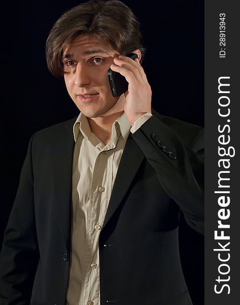 Businessman talking on smart-phone