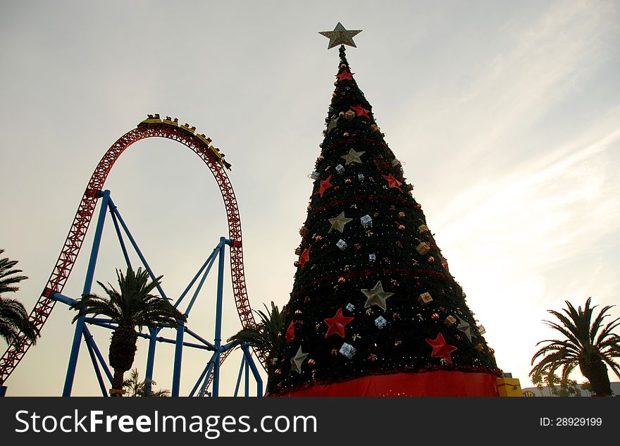 Movieworld's annual Christmas tree for White Christmas with the Superman ride in the background. Movieworld's annual Christmas tree for White Christmas with the Superman ride in the background