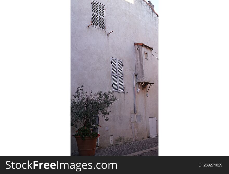 Old bilding in France with cloused wiindows