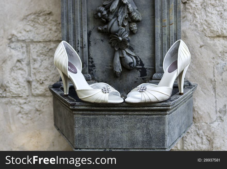 Wedding Shoes With Stone Wall & Sculpture