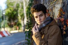 Attractive Young Handsome Man, Model Of Fashion In A Park Royalty Free Stock Image Attractive Young Handsome Man, Model Of Fashion In A Park Royalty Free Stock Image