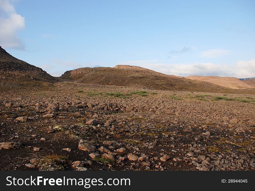 Rocky landscape on the Putorana plateau. The origins of the river Bucharama. Russia, Taimyr Peninsula. Rocky landscape on the Putorana plateau. The origins of the river Bucharama. Russia, Taimyr Peninsula.