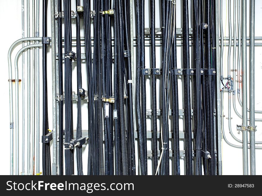 Communication and electrical wire on wall