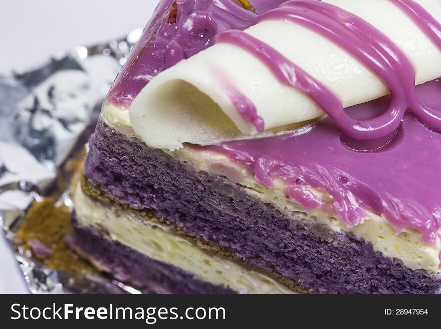 Taro cake on grey background.