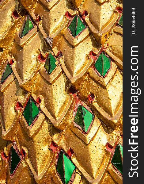 Gold and green dragon scale pattern
