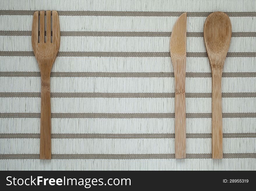 Table setting with wooden cutlery