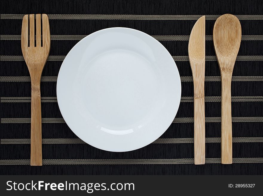 Table setting with wooden cutlery