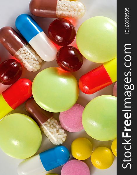 Colored pills, tablets and capsules