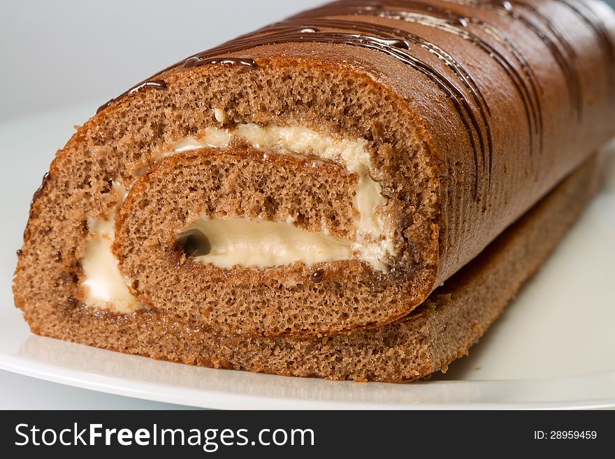 Chocolate roll with stuffing, close-up