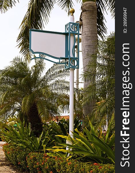 Blank sign in a tropical environment
