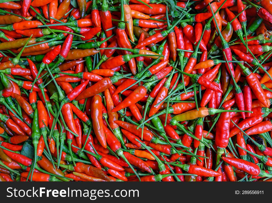 Red chili peppers on flat surface