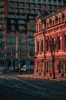 View Of City Street With Tram Tracks, And An Old Red Building, Evening Time, Kyiv. Royalty Free Stock Photos View Of City Street With Tram Tracks, And An Old Red Building, Evening Time, Kyiv. Royalty Free Stock Photos