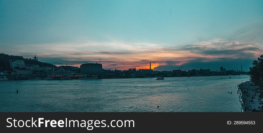 Panoramic view of Building silhouettes of Kiev at sunset, Ukraine. Toned.