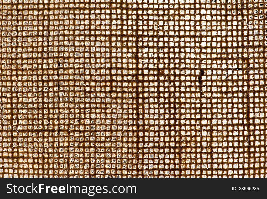 Background texture of woven jute, a strong natural plant fibre used in making sacking and bags