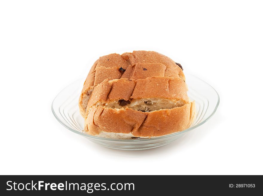 Piece of bread on dish, isolated on white background. Piece of bread on dish, isolated on white background.
