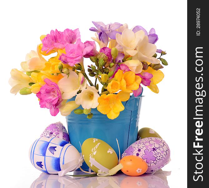 Spring flowers with easter eggs