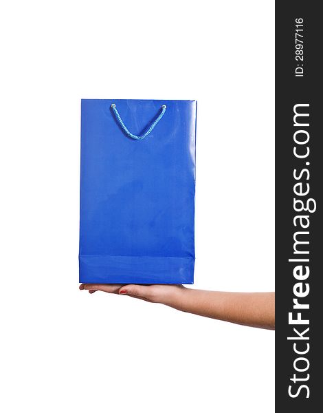 Woman holding a paper bag isolated