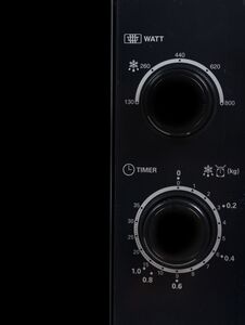 Black Microwave Panel With Buttons Royalty Free Stock Image
