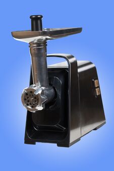 Mincing Machine On Blue Background Royalty Free Stock Photography