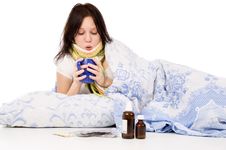 The Sick Girl Lying In Bed Stock Photography