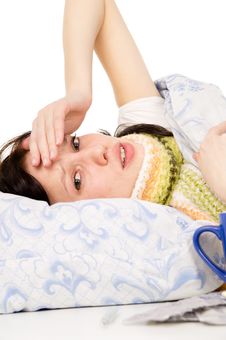 The Diseased Beautiful Girl Lying In Bed, Aching Head Stock Photo The Diseased Beautiful Girl Lying In Bed, Aching Head Stock Photo