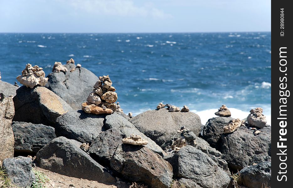 Stacked artistically rocks on the beach in Aruba, Andicuri Bay. Stacked artistically rocks on the beach in Aruba, Andicuri Bay