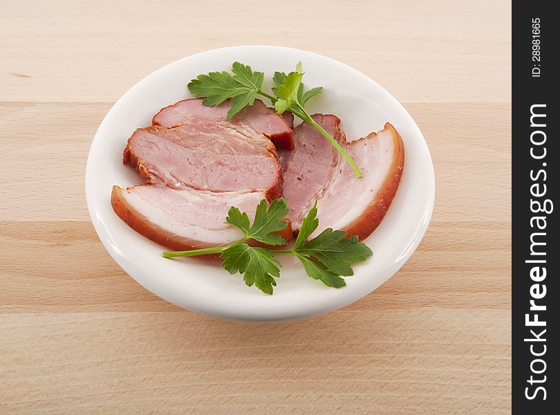Bacon With Parsley On Dish
