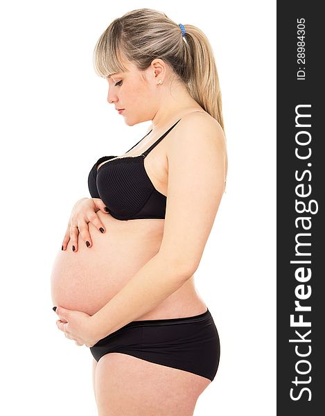 Pregnant girl in underwear in profile. Pregnant girl in underwear in profile