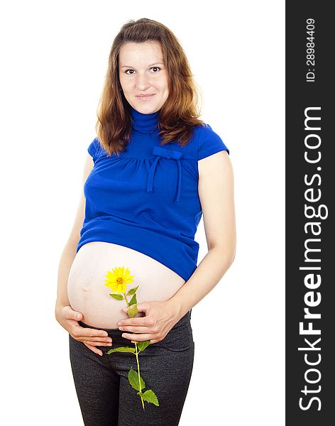 Pregnant woman standing and holding his stomach. Pregnant woman standing and holding his stomach