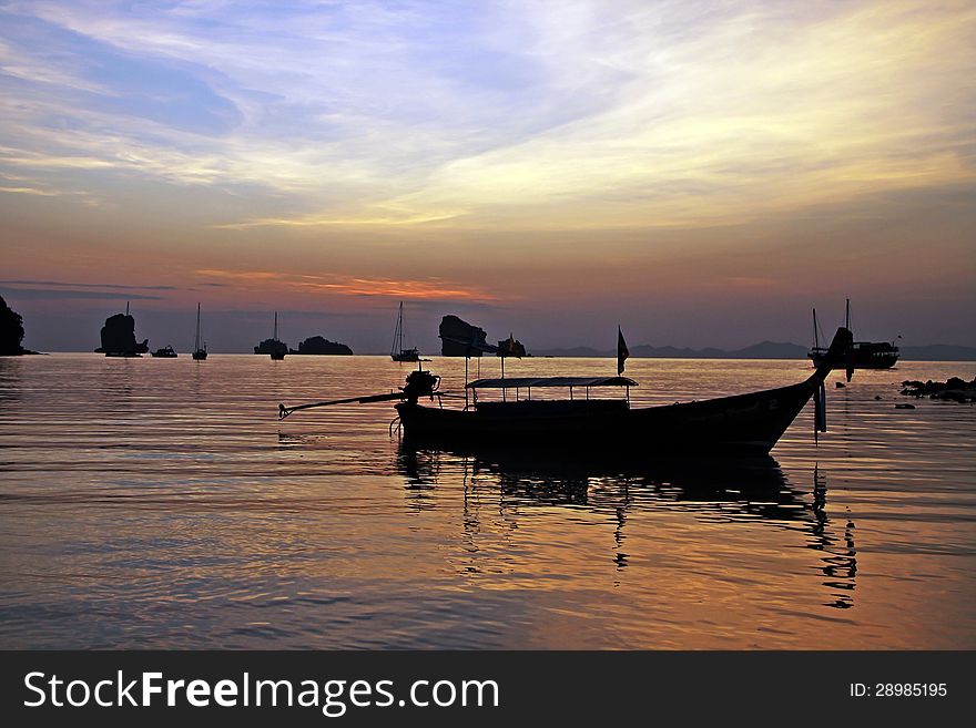 Lonely fisherboat in quiet waters near Krabi beach Thailand. Lonely fisherboat in quiet waters near Krabi beach Thailand