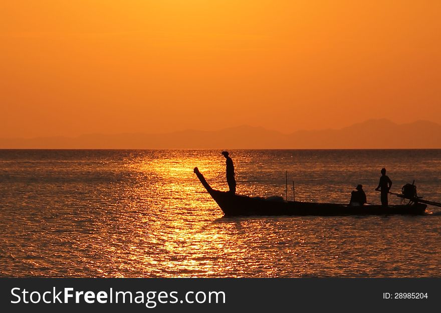Lonely fisherboat in quiet waters near Krabi beach Thailand. Lonely fisherboat in quiet waters near Krabi beach Thailand