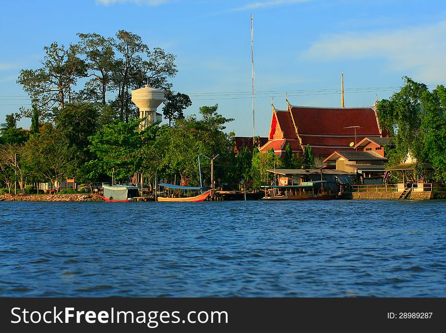 Local Thai style house beside river. Local Thai style house beside river.