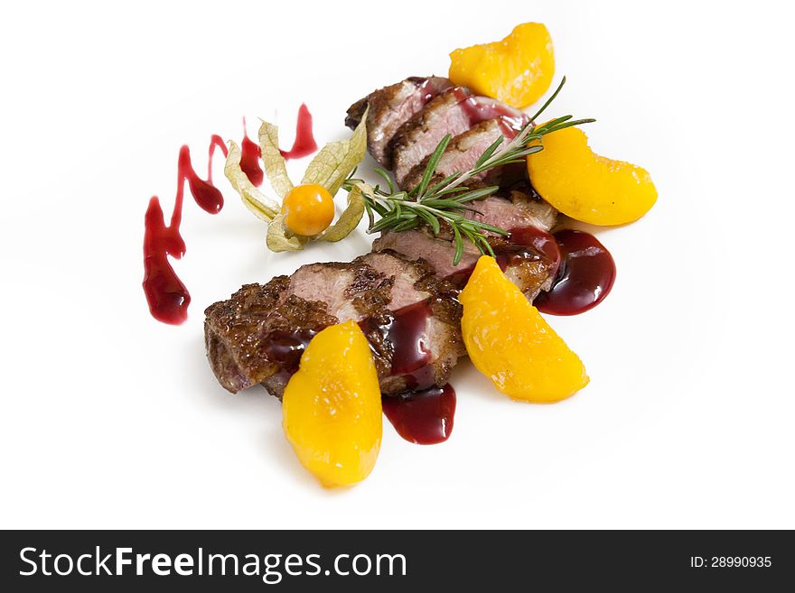 Lamb with fruit and berry sauce