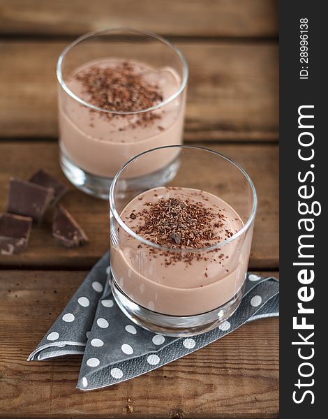 Delicious chocolate dessert in glasses. Delicious chocolate dessert in glasses.