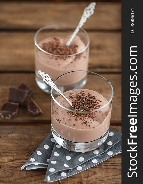 Delicious chocolate dessert in glasses. Delicious chocolate dessert in glasses.