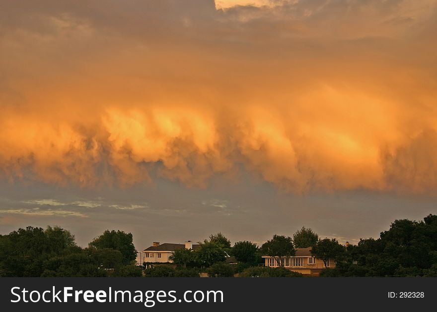 Smoke filled clouds billowing over hilltop overlooking LA Basin during fire at sunset. Smoke filled clouds billowing over hilltop overlooking LA Basin during fire at sunset