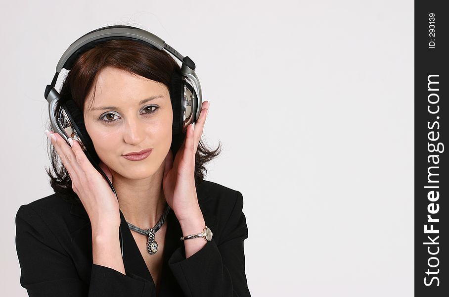 Businesswoman listening to her favorite music