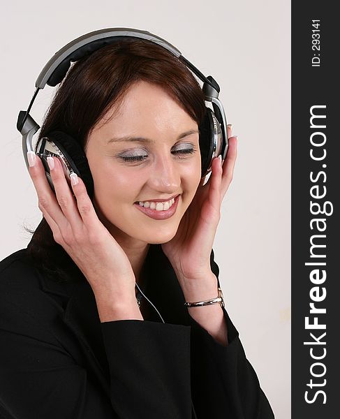 Businesswoman listening to her favorite music