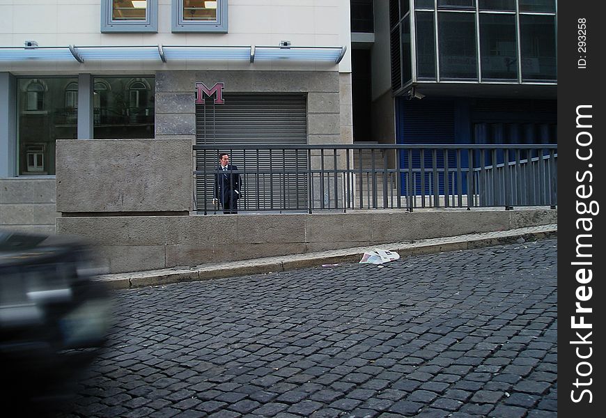 Business man on the subway entrance