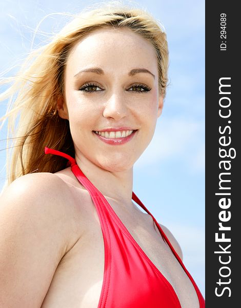 Photo of a pretty model up close portrait in bikini. Photo of a pretty model up close portrait in bikini.