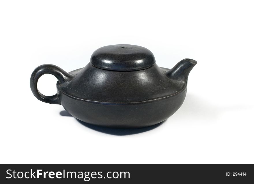 Old Chinese clay teapot in dark lacquer. Used more for decorative purposes than pouring tea. Old Chinese clay teapot in dark lacquer. Used more for decorative purposes than pouring tea.